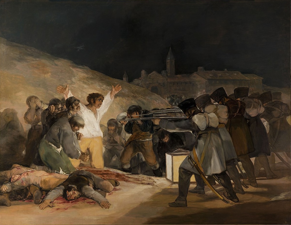 Francisco Goya, The Third of May 1808, 1814. A man in white with arms raised faces a firing squad at night. Other victims lie dead on the ground.