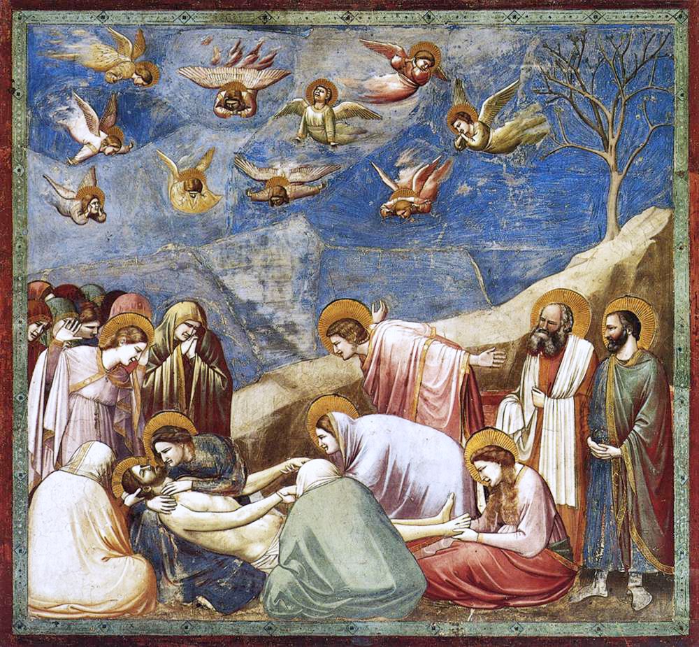 Mourners crowd around the body of Christ in front of a bare rocky slope, with angels wheeling in the sky.