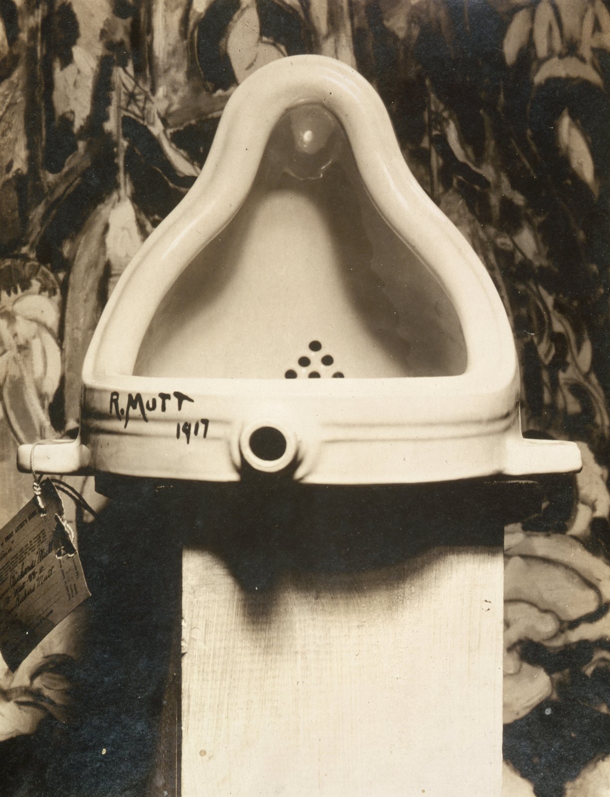 Marcel Duchamp, Fountain, 1917. A porcelain urinal turned on its back, signed 'R. Mutt 1917.'