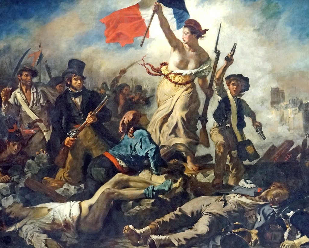 Eugène Delacroix, Liberty Leading the People, 1830. An allegorical female figure representing Liberty advances over a barricade holding the tricolor flag, surrounded by revolutionary fighters amid smoke and fallen bodies.