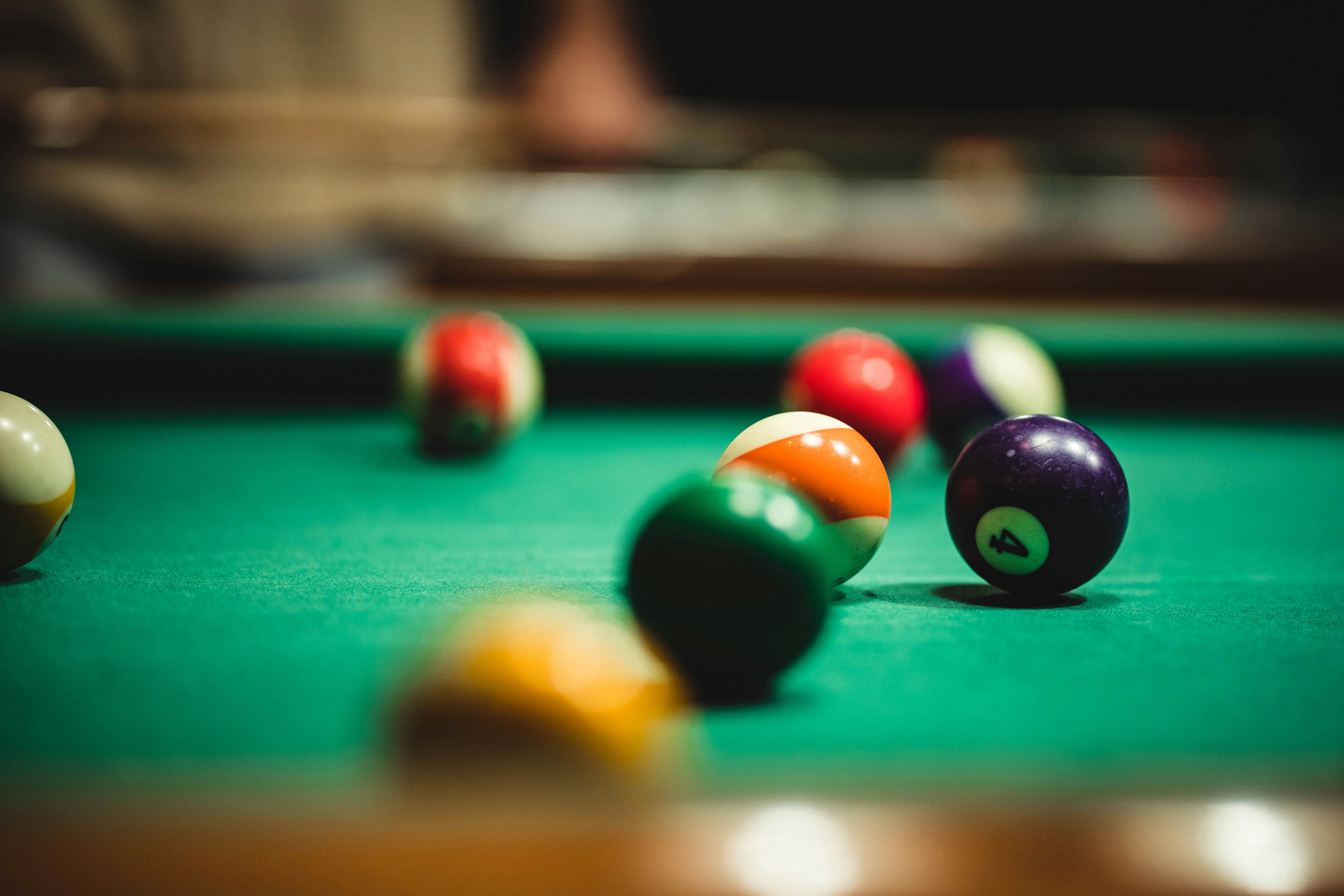 Photograph of billiard balls on a green felt table. Hume used the collision of billiard balls as his central example for analyzing causation: we see two balls collide and one move, but do we actually see any causal power passing between them?