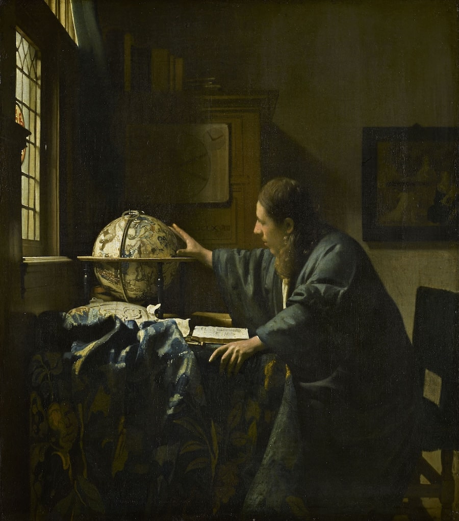 Johannes Vermeer, The Astronomer, 1668. A scholar in a dark robe leans forward to examine a celestial globe by the light of a window, with books and instruments spread across the table.