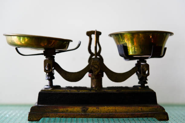 Photograph of a two-pan balance scale.